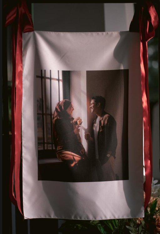 Close-up of a printed couple photo signage banner