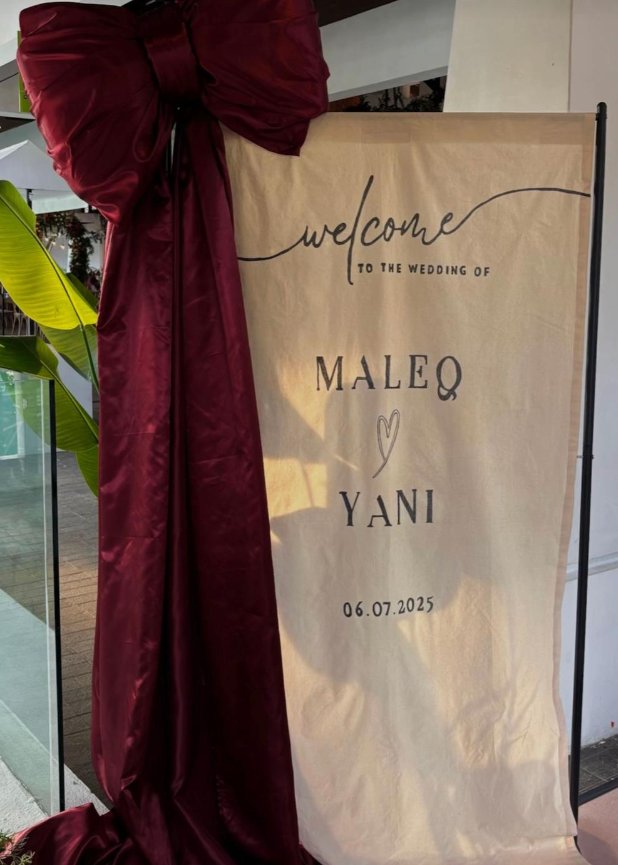 Welcome linen banner with couple names and date
